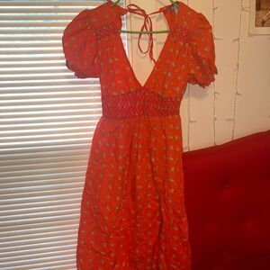 Orange patterned midi dress